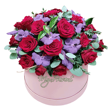 Roses et orchidees dans une boîte — harmonie entre passion et élégance